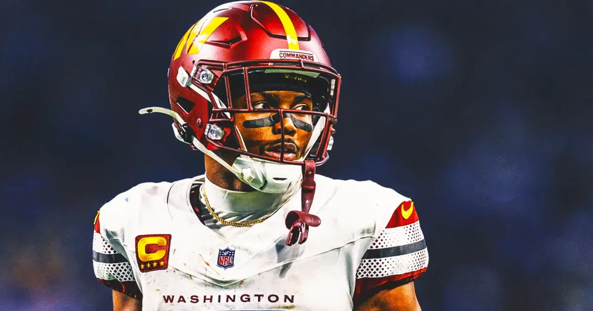 Terry McLaurin standing on Commanders sideline during training camp amid contract dispute